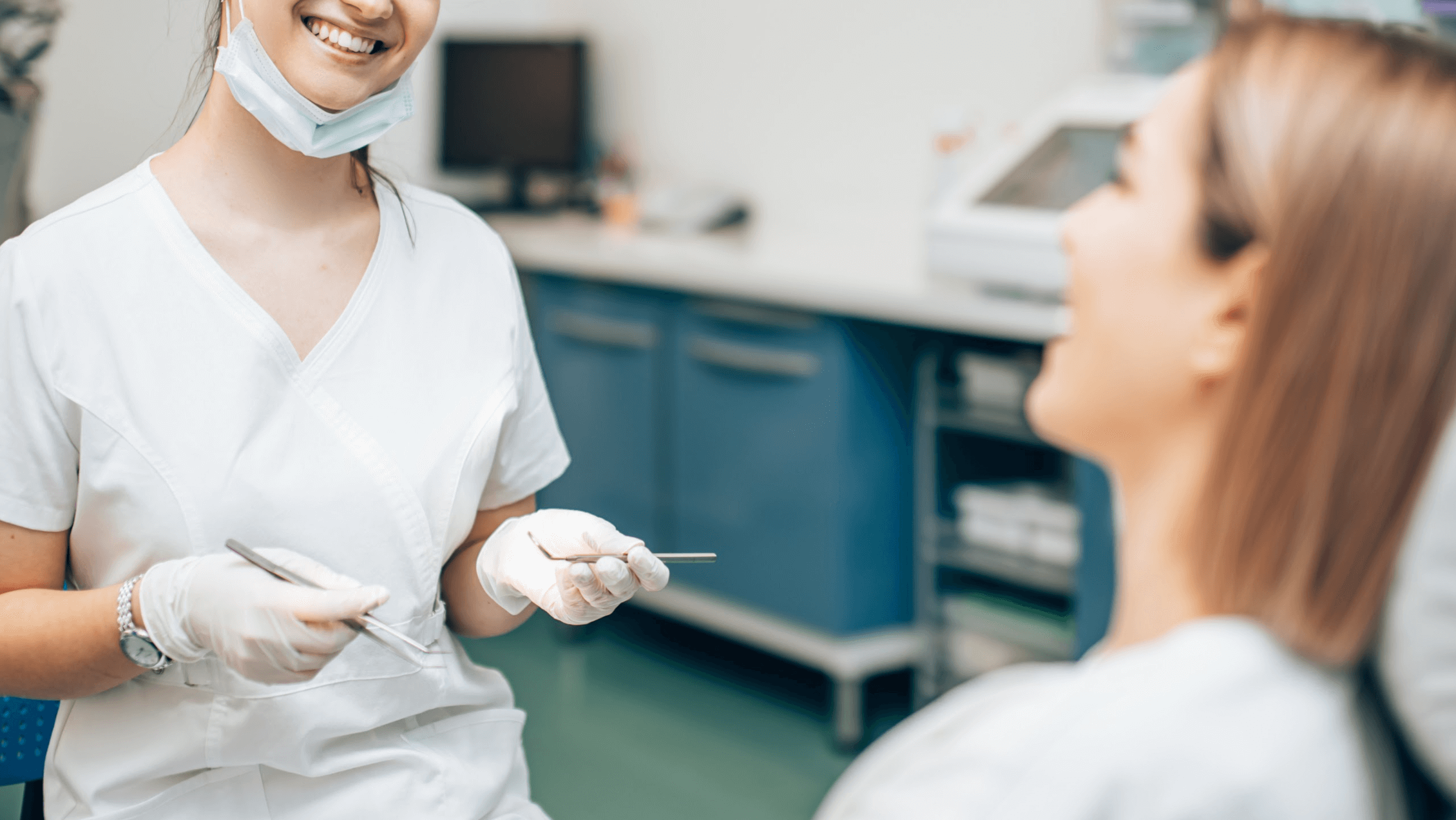 woman at dentist smiling